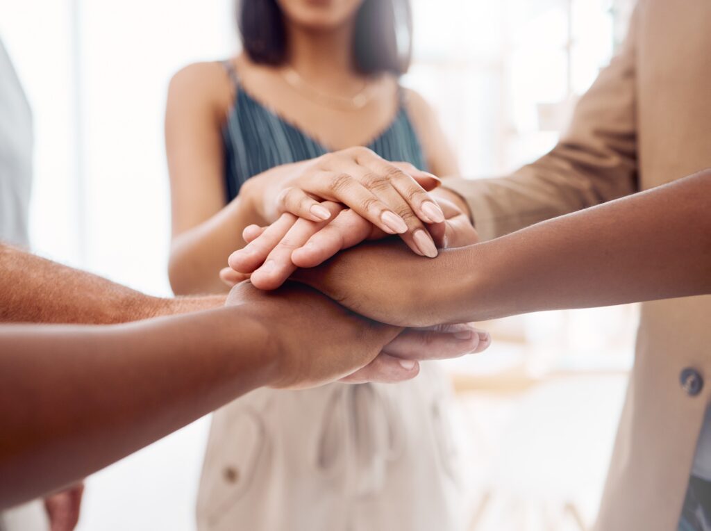Teamwork, support and stack of hands of business people for community, trust and collaboration in o